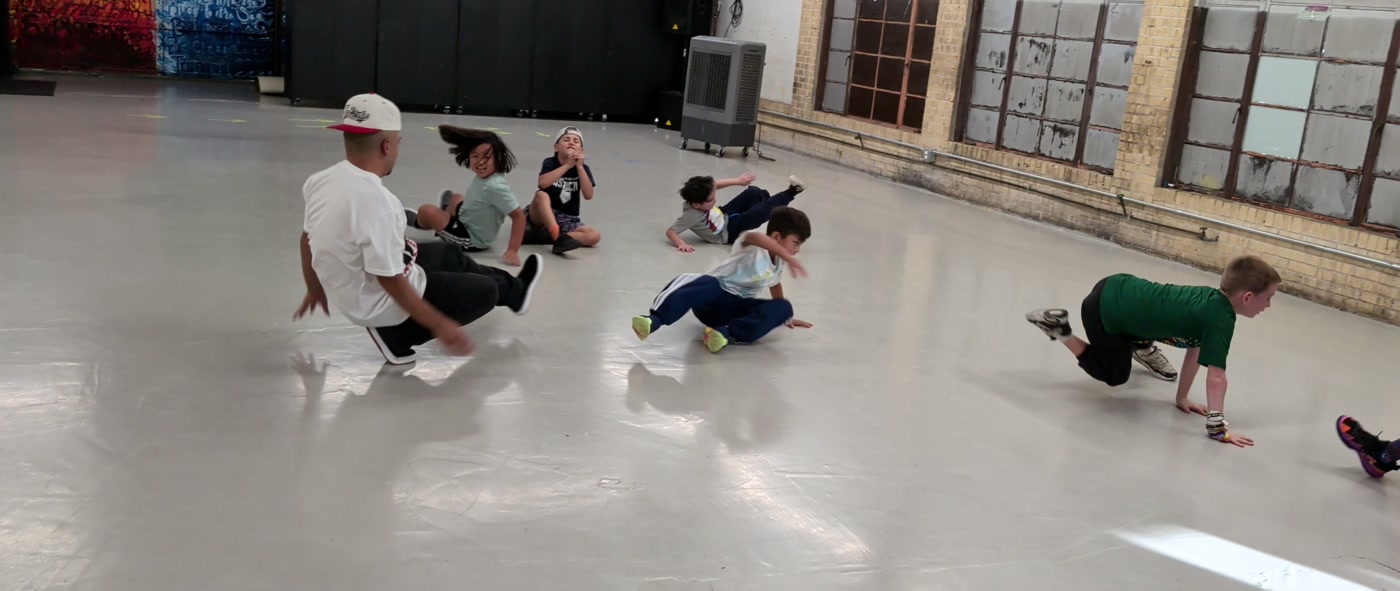 Bboy Wicket leading breakin&rsquo; footwork drills with kids ages 8-17 at Danzversity in Austin